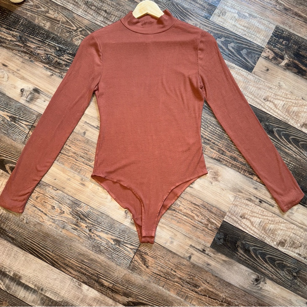 Belle Du Jour Size Large Bodysuit